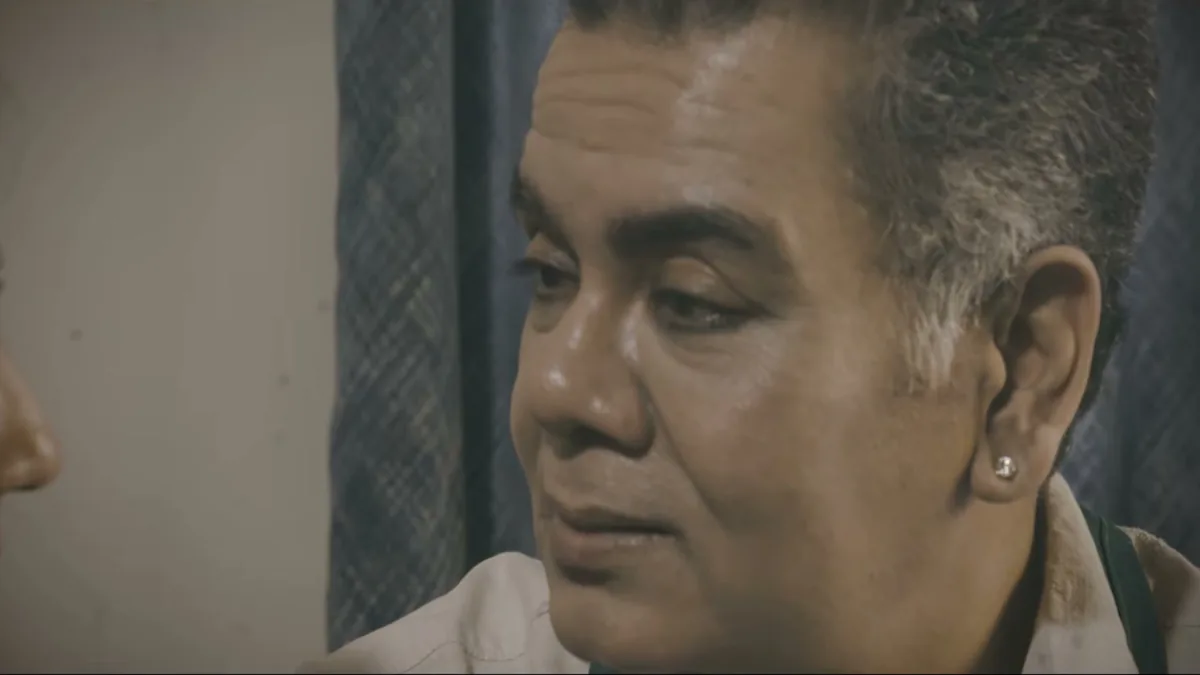 A man's face in profile against a window, a still from TEH, The Layer