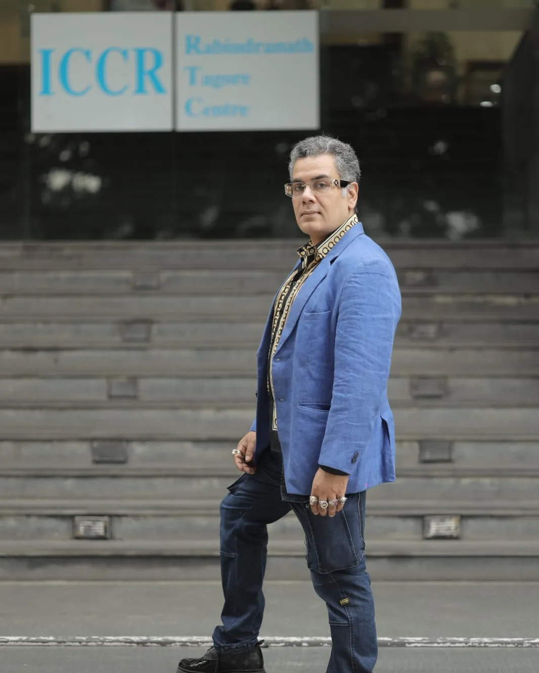Sudeep Ranjan Sarkar walking down the steps of the Rabindranath Tagore Centre, Kolkata